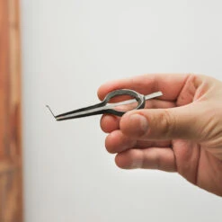 Cast Iron Jaw Harp -CARVED CULTURE Sale Cast Iron Mouth Jaw Harp from Nepal Held in Hand