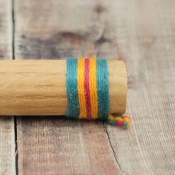 Cactus Rainstick - 15cm 6 Cactus Rainstick - 15cm -CARVED CULTURE Sale Close Up of Cactus Rainstick End with Colorful Woven Band 1
