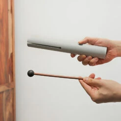 Front Page 25 Front Page -CARVED CULTURE Sale Kutawapa Wah Wah Tube Instrument Held in Hand